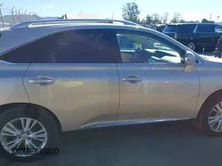 2011 Lexus RX 450h with VIN JTJBC1BAXB2420753, listed as a IAAI auction lot 41823358 with 102,714 mi miles and . Bid and sale history available at DreamBid. Image 13.