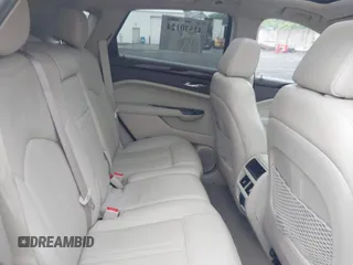 2013 Cadillac SRX Performance Collection with VIN 3GYFNHE34DS628486, listed as a IAAI auction lot 42530124 with 76,778 mi miles and . Bid and sale history available at DreamBid. Image 8.