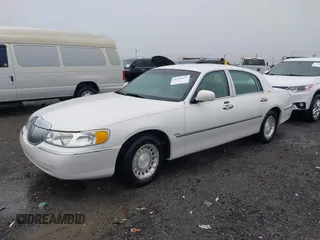 2002 Lincoln Town Car Executive z VIN 1LNHM81W42Y636204, wystawiony jako IAAI lot #42194479 z przebiegiem Nie podano mil oraz . Historia ofert i sprzedaży dostępna na DreamBid. Obrazek 17.