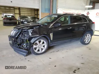 2014 Cadillac SRX Premium Collection z VIN 3GYFNGE38ES581832, wystawiony jako Copart lot #52129115 z przebiegiem 83 468 mil mil oraz Szkody całkowita. Historia ofert i sprzedaży dostępna na DreamBid. Obrazek 1.