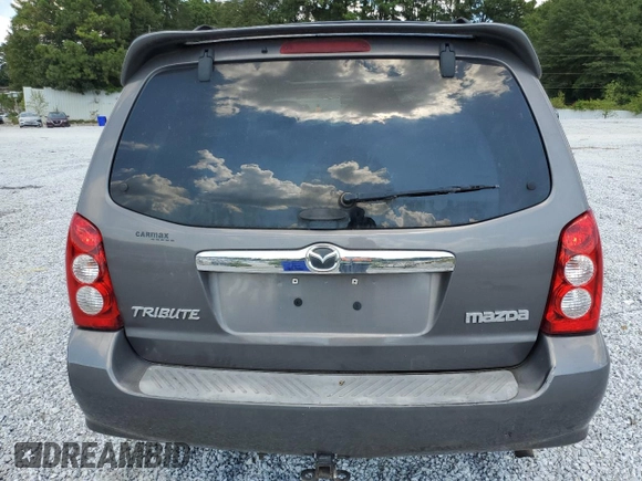 2006 Mazda Tribute S with VIN 4F2YZ06186KM08378, listed as a Copart auction lot 69391894 with Not Provided miles and Salvage Title. Bid and sale history available at DreamBid. Image 6.