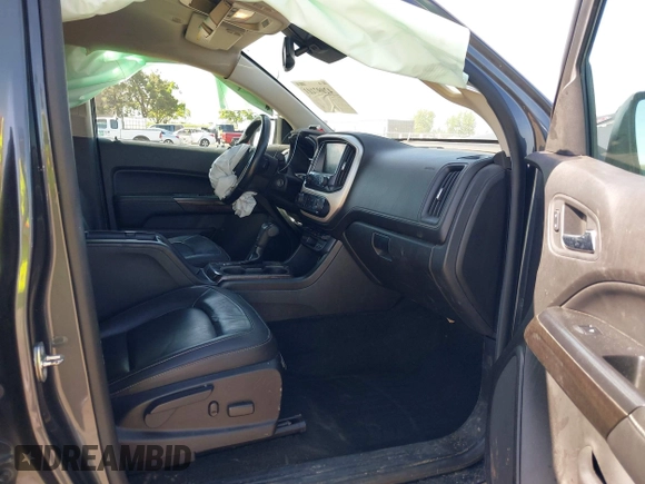 2016 GMC Canyon 4WD SLT with VIN 1GTP6DE15G1323650, listed as a IAAI auction lot 42097101 with 240,662 mi miles. Bid and sale history available at carsss.com. Image 5.