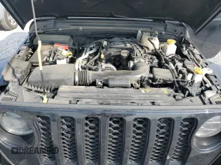 2023 Jeep Gladiator Sport S with VIN 1C6HJTAG7PL517812, listed as a Copart auction lot 60200015 with 38,793 mi miles and Clean title. Bid and sale history available at DreamBid. Image 11.