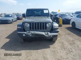 2020 Jeep Wrangler Unlimited Sport S z VIN 1C4HJXDN2LW261730, wystawiony jako IAAI lot #42034942 z przebiegiem 61 465 mil mil oraz . Historia ofert i sprzedaży dostępna na DreamBid. Obrazek 12.