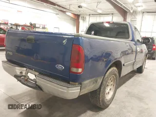 1997 Ford F-150 with VIN 1FTDF1767VKC52713, listed as a IAAI auction lot 42212161 with 136,306 mi miles and . Bid and sale history available at DreamBid. Image 4.
