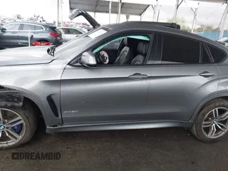 2016 BMW X6 xDrive50i with VIN 5UXKU6C59G0S82526, listed as a IAAI auction lot 41786622 with 110,796 mi miles and . Bid and sale history available at DreamBid. Image 13.
