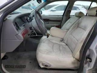 2000 Mercury Grand Marquis LS z VIN 2MEFM75W4YX722958, wystawiony jako Copart lot #47927745 z przebiegiem 148 461 mil mil oraz Szkoda całkowita • Salvage title. Historia ofert i sprzedaży dostępna na DreamBid. Obrazek 7.
