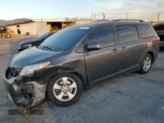 2015 Toyota Sienna LE AAS with VIN 5TDKK3DC8FS609769, listed as a Copart auction lot 87512475 with 140,536 mi miles and Salvage Title. Bid and sale history available at carsss.com. Image 1.