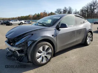 2023 Tesla Model Y Long Range z VIN 7SAYGDEE5PA200975, wystawiony jako Copart lot #53750465 z przebiegiem 13 562 mil mil oraz Szkoda całkowita • Salvage title. Historia ofert i sprzedaży dostępna na DreamBid. Obrazek 1.