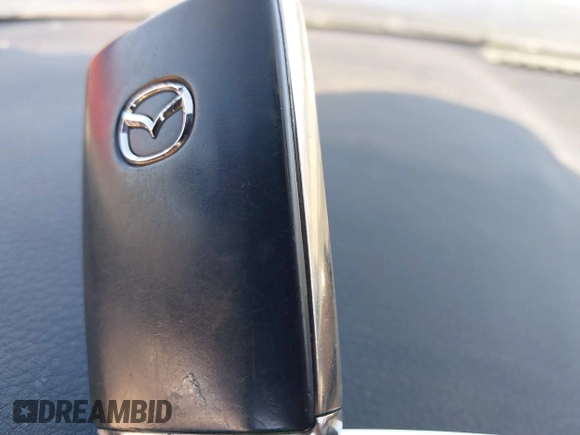 2023 Mazda 3 S Preferred with VIN 3MZBPACM1PM358821, listed as a IAAI auction lot 41666289 with 42,960 mi miles and . Bid and sale history available at DreamBid. Image 11.