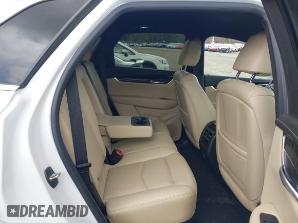 2017 Cadillac XT5 FWD with VIN 1GYKNARS2HZ310866, listed as a IAAI auction lot 41865458 with 70,375 mi miles. Bid and sale history available at carsss.com. Image 8.