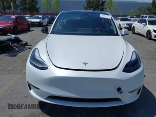 2023 Tesla Model Y Long Range with VIN 7SAYGAEE5PF855834, listed as a IAAI auction lot 41943491 with 34,480 mi miles. Bid and sale history available at carsss.com. Image 13.