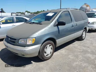 2000 Toyota Sienna LE with VIN 4T3ZF13C2YU293649, listed as a IAAI auction lot 42299543 with 139,504 mi miles and . Bid and sale history available at DreamBid. Image 2.