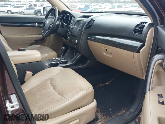 2013 Kia Sorento EX with VIN 5XYKU4A21DG312753, listed as a IAAI auction lot 41033124 with 197,459 mi miles and . Bid and sale history available at carsss.com. Image 5.
