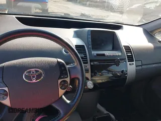 2008 Toyota Prius z VIN JTDKB20UX87728753, wystawiony jako IAAI lot #42425682 z przebiegiem Nie podano mil oraz . Historia ofert i sprzedaży dostępna na DreamBid. Obrazek 12.