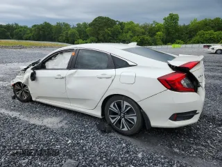 2016 Honda Civic EX-T с VIN 2HGFC1F35GH641158, выставлен на аукционе Copart как лот 59027175 с пробегом Не указан миль и Списание • Salvage title. История ставок и продаж доступна на DreamBid. Изображение 2.