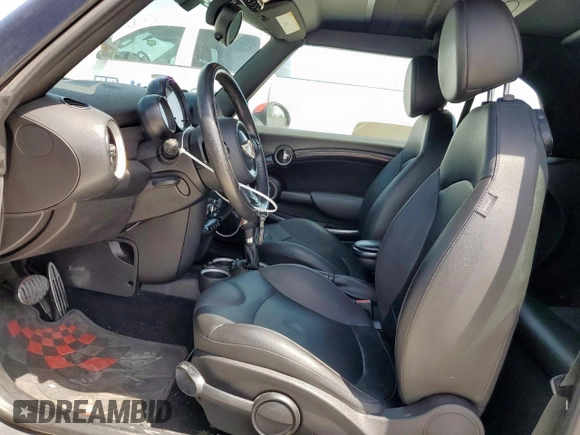 2013 MINI Convertible S с VIN WMWZP3C57DT705259, выставлен на аукционе Copart как лот 59954795 с пробегом 132 988 миль миль и Списание • Salvage title. История ставок и продаж доступна на DreamBid. Изображение 7.