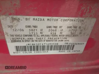 2007 Mazda Mazda3 i Sport with VIN JM1BK32FX71693508, listed as a IAAI auction lot 41934556 with 162,520 mi miles. Bid and sale history available at carsss.com. Image 9.