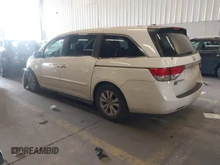 2014 Honda Odyssey EX-L with VIN 5FNRL5H60EB030841, listed as a IAAI auction lot 42271401 with 107,343 mi miles and . Bid and sale history available at DreamBid. Image 3.