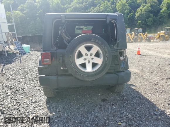 2012 Jeep Wrangler Sport with VIN 1C4AJWAG6CL256792, listed as a Copart auction lot 62634515 with 137,507 mi miles and Salvage title. Bid and sale history available at DreamBid. Image 6.