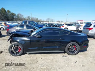 2016 Ford Mustang V6 z VIN 1FA6P8AM5G5226866, wystawiony jako IAAI lot #41306547 z przebiegiem Nie podano mil oraz . Historia ofert i sprzedaży dostępna na DreamBid. Obrazek 14.