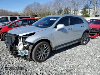2019 Cadillac XT4 AWD Premium Luxury with VIN 1GYFZDR45KF126233, listed as a Copart auction lot 52780855 with 56,813 mi miles and Salvage title. Bid and sale history available at DreamBid. Image 1.