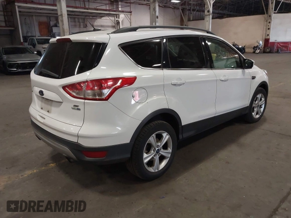 2014 Ford Escape SE with VIN 1FMCU9G90EUD81774, listed as a IAAI auction lot 42067148 with 115,277 mi miles. Bid and sale history available at carsss.com. Image 4.