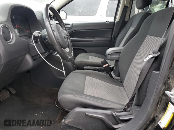 2013 Jeep Compass Latitude with VIN 1C4NJDEB2DD246079, listed as a Copart auction lot 52774255 with 149,586 mi miles and Clean Title. Bid and sale history available at carsss.com. Image 7.