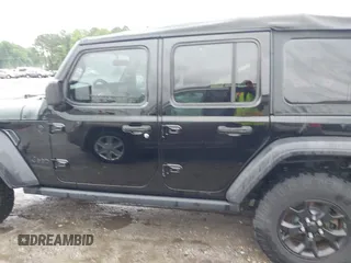 2021 Jeep Wrangler Unlimited Sport S with VIN 1C4HJXDN0MW678801, listed as a IAAI auction lot 42211815 with 96,849 mi miles and . Bid and sale history available at DreamBid. Image 14.