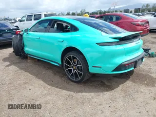 2022 Porsche Taycan 4S z VIN WP0AB2Y12NSA45396, wystawiony jako IAAI lot #41946433 z przebiegiem 9389 mil mil oraz . Historia ofert i sprzedaży dostępna na DreamBid. Obrazek 3.