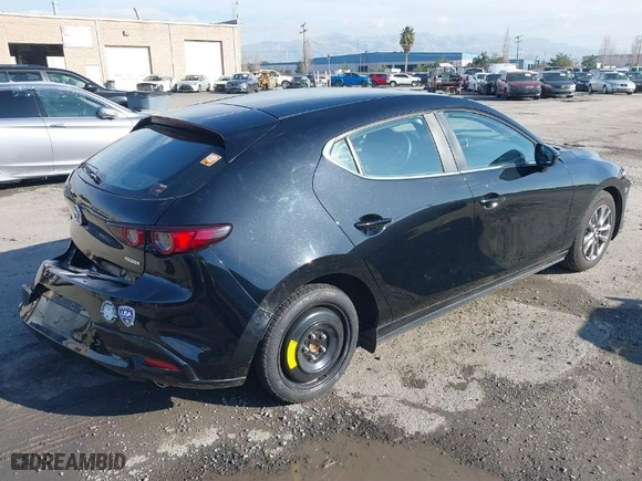 2021 Mazda Mazda3 Hatchback 2.5 S with VIN JM1BPAJLXM1314726, listed as a IAAI auction lot 41193185 with 43,546 mi miles. Bid and sale history available at carsss.com. Image 4.