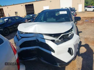 2023 Toyota RAV4 Hybrid XSE with VIN 2T3E6RFV1PW038080, listed as a IAAI auction lot 42518107 with 14,430 mi miles and . Bid and sale history available at DreamBid. Image 12.