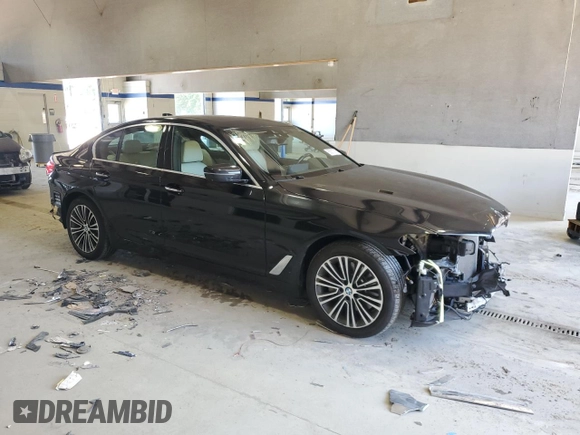 2018 BMW 5 Series 540i xDrive with VIN WBAJE7C56JWC57314, listed as a Copart auction lot 60610715 with 73,015 mi miles and Salvage title. Bid and sale history available at DreamBid. Image 4.
