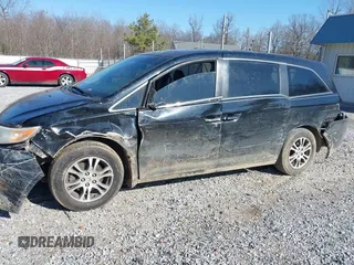 2012 Honda Odyssey EX-L with VIN 5FNRL5H69CB017227, listed as a IAAI auction lot 41345254 with 136,775 mi miles and . Bid and sale history available at carsss.com. Image 6.
