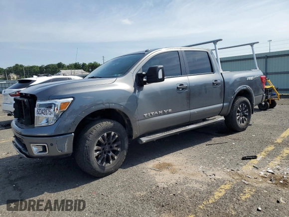 2018 Nissan Titan SV with VIN 1N6AA1E50JN514802, listed as a Copart auction lot 62342875 with 101,593 mi miles and Salvage title. Bid and sale history available at DreamBid. Image 1.