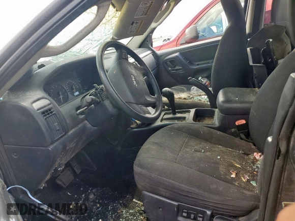2003 Jeep Grand Cherokee Laredo with VIN 1J4GX48S63C604527, listed as a Copart auction lot 55996725 with Not provided miles and Non repairable. Bid and sale history available at DreamBid. Image 7.