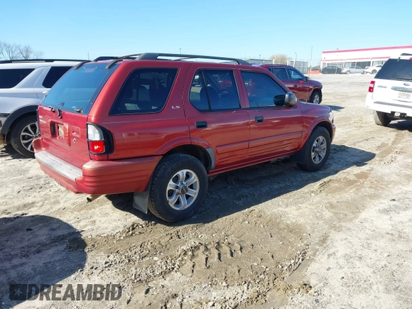 2001 Isuzu Rodeo S with VIN 4S2CK58W814326849, listed as a IAAI auction lot 41769624 with 366,460 mi miles and . Bid and sale history available at DreamBid. Image 4.