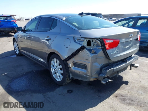 2014 Kia Optima EX z VIN 5XXGN4A72EG339786, wystawiony jako IAAI lot #42328516 z przebiegiem 103 035 mil mil oraz . Historia ofert i sprzedaży dostępna na DreamBid. Obrazek 3.