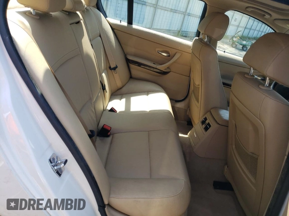 2009 BMW 3 Series 328i with VIN WBAPH77569NL84073, listed as a Copart auction lot 52185535 with 114,929 mi miles and Salvage Title. Bid and sale history available at carsss.com. Image 10.