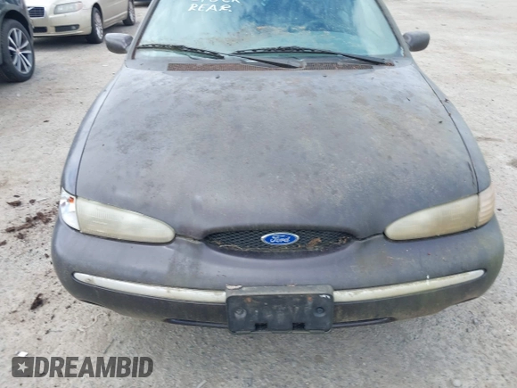 1995 Ford Contour z VIN 3FALP6633SM116313, wystawiony jako IAAI lot #42058920 z przebiegiem 192 905 mil mil oraz . Historia ofert i sprzedaży dostępna na DreamBid. Obrazek 6.