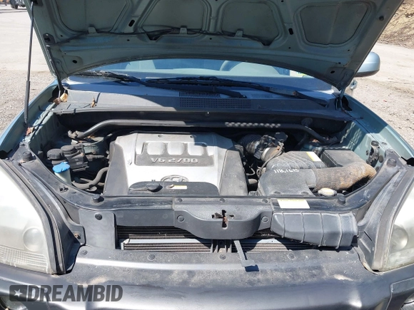 2006 Hyundai Tucson GLS with VIN KM8JN12D06U285856, listed as a IAAI auction lot 42112640 with 157,016 mi miles. Bid and sale history available at carsss.com. Image 10.