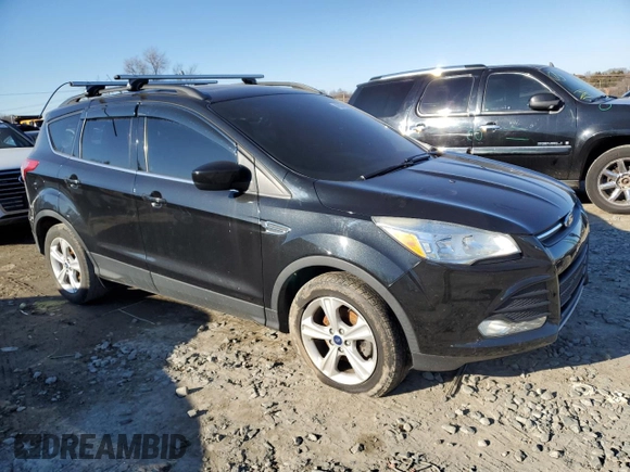 2014 Ford Escape SE with VIN 1FMCU0GXXEUC49700, listed as a Copart auction lot 46371155 with 142,541 mi miles and Salvage Title. Bid and sale history available at DreamBid. Image 4.