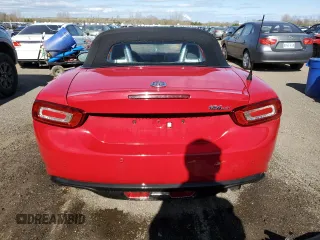 2017 FIAT 124 Spider Lusso z VIN JC1NFAEKXH0106484, wystawiony jako Copart lot #55729775 z przebiegiem 104 341 mil mil oraz Tytuł czysty. Historia ofert i sprzedaży dostępna na DreamBid. Obrazek 6.