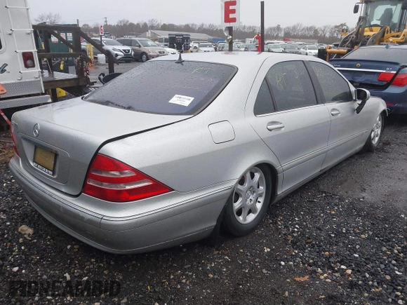 2001 Mercedes-Benz S-Class with VIN WDBNG75JX1A196406, listed as a IAAI auction lot 41682384 with 999,999 mi miles. Bid and sale history available at carsss.com. Image 4.