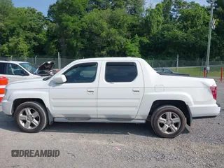 2010 Honda Ridgeline RTL with VIN 5FPYK1F58AB012526, listed as a IAAI auction lot 42421618 with 258,727 mi miles and . Bid and sale history available at DreamBid. Image 14.