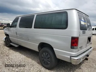 2011 Ford Econoline Passenger XL with VIN 1FBNE3BL8BDA53030, listed as a Copart auction lot 69919024 with 196,386 mi miles and Salvage Title. Bid and sale history available at carsss.com. Image 2.