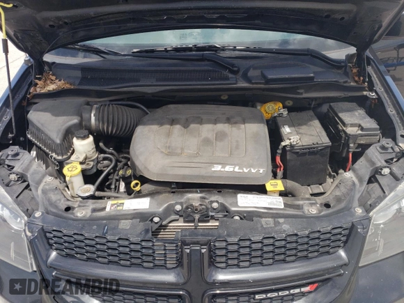 2018 Dodge Grand Caravan SE Plus with VIN 2C4RDGBG2JR199767, listed as a Copart auction lot 54182325 with 137,522 mi miles and Salvage Title. Bid and sale history available at DreamBid. Image 12.