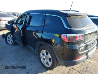 2019 Jeep Compass Latitude with VIN 3C4NJCBB1KT851846, listed as a IAAI auction lot 41219621 with 56,626 mi miles and . Bid and sale history available at DreamBid. Image 3.