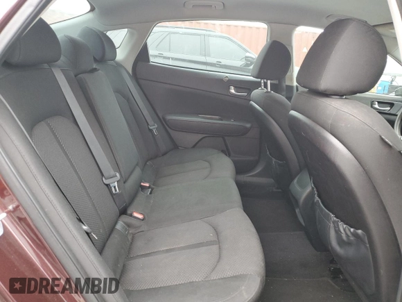 2016 Kia Optima LX z VIN 5XXGT4L3XGG025113, wystawiony jako Copart lot #51310875 z przebiegiem 188 415 mil mil oraz Szkoda całkowita • Salvage title. Historia ofert i sprzedaży dostępna na DreamBid. Obrazek 10.