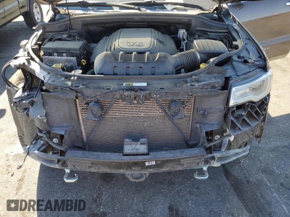 2019 Jeep Grand Cherokee Overland with VIN 1C4RJFCT7KC833390, listed as a Copart auction lot 74015774 with 64,598 mi miles and Salvage Title. Bid and sale history available at carsss.com. Image 12.